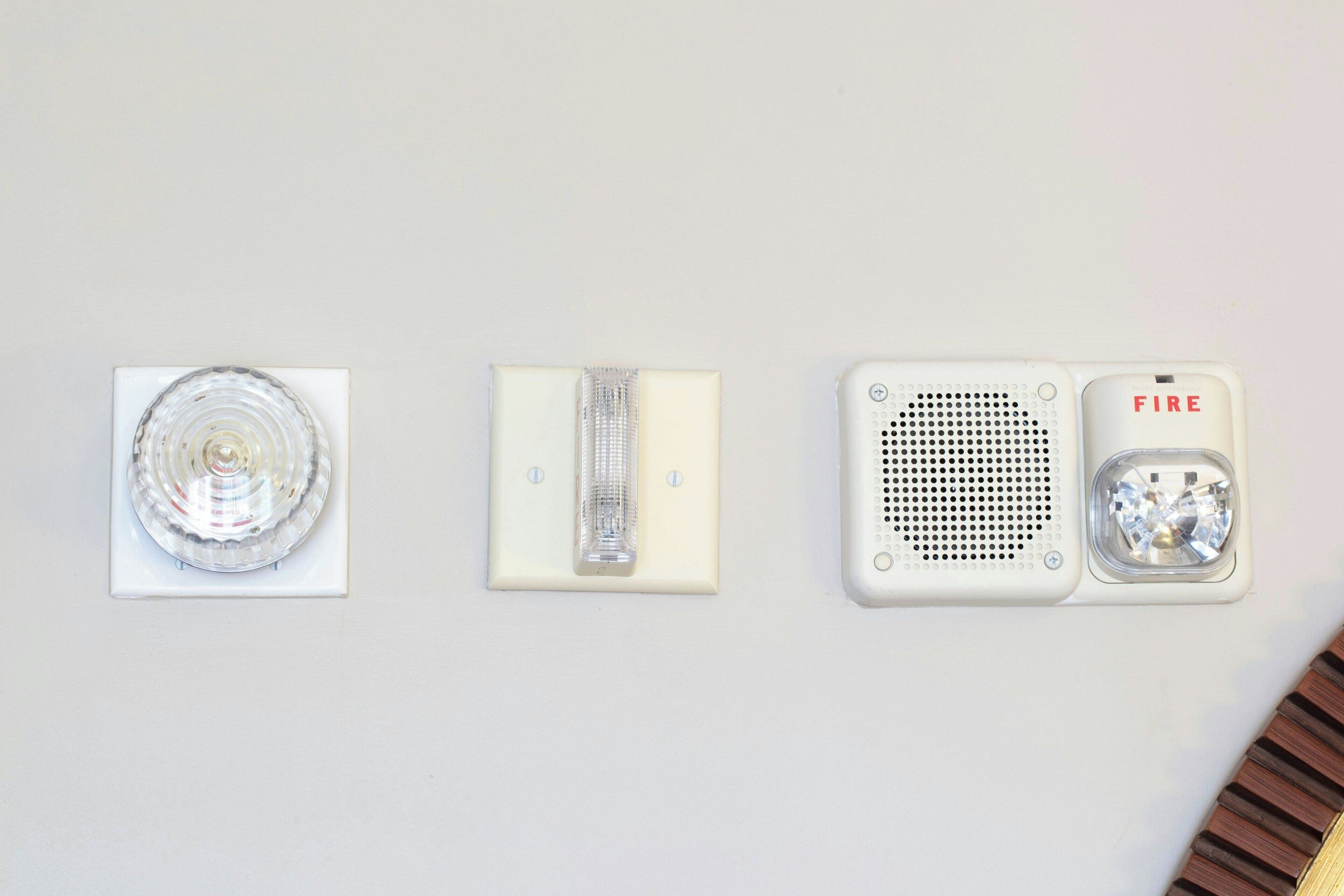 Three wall-mounted light fixtures.