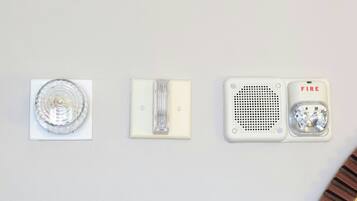 Three wall-mounted light fixtures.