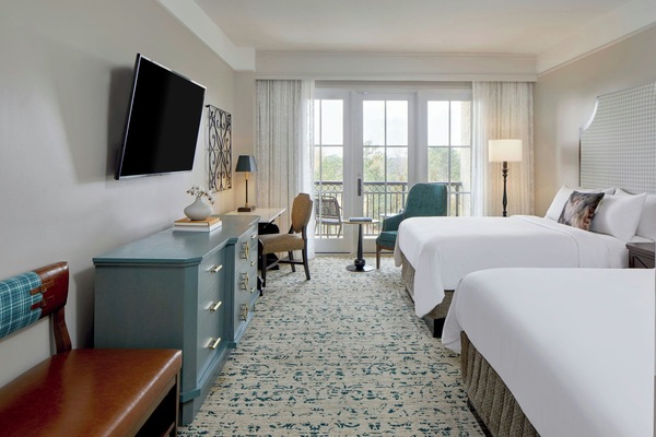 Premium bedding, down comforters, pillowtop beds, in-room safe