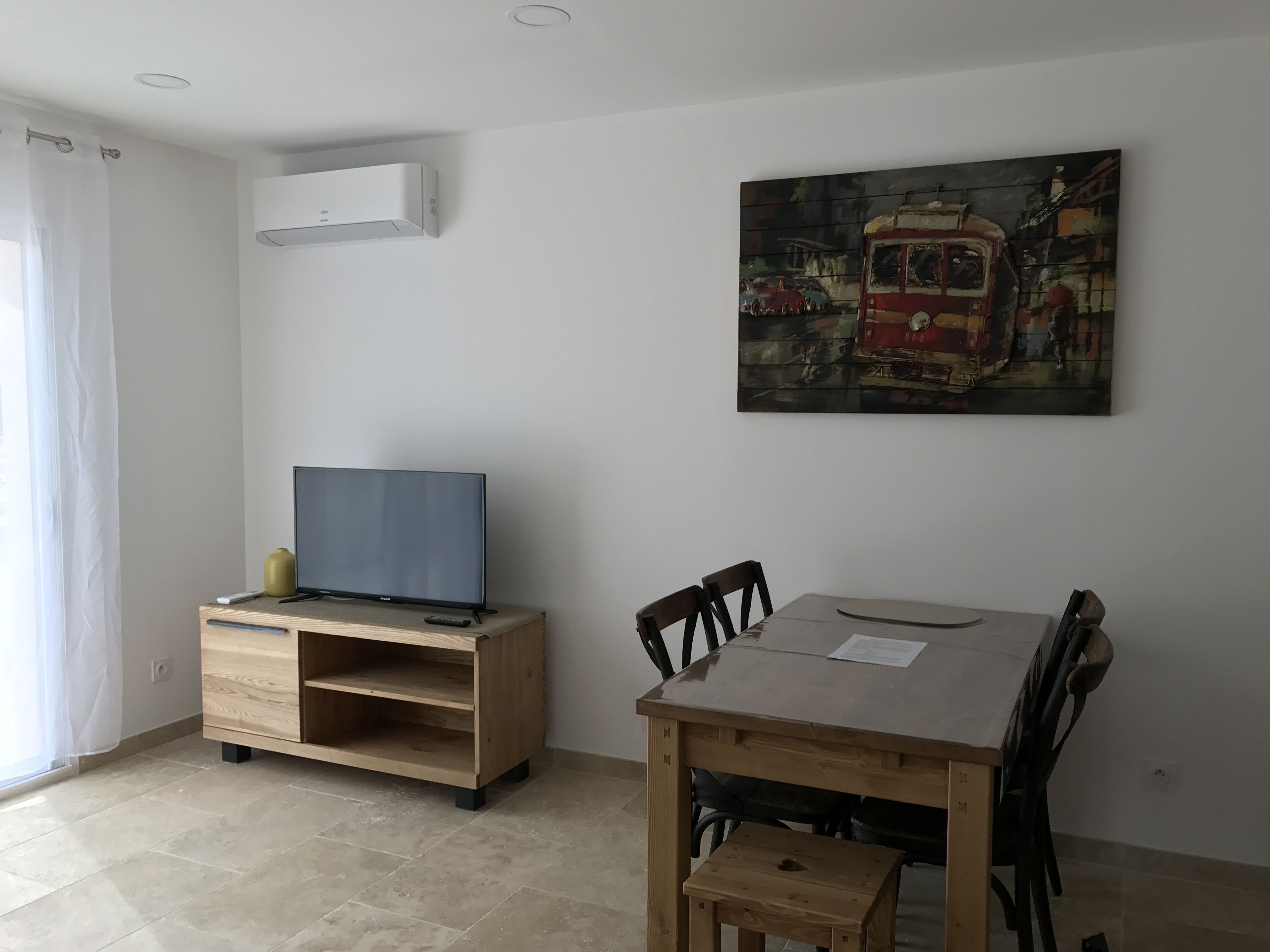 superior apartment | living area | flat-screen tv