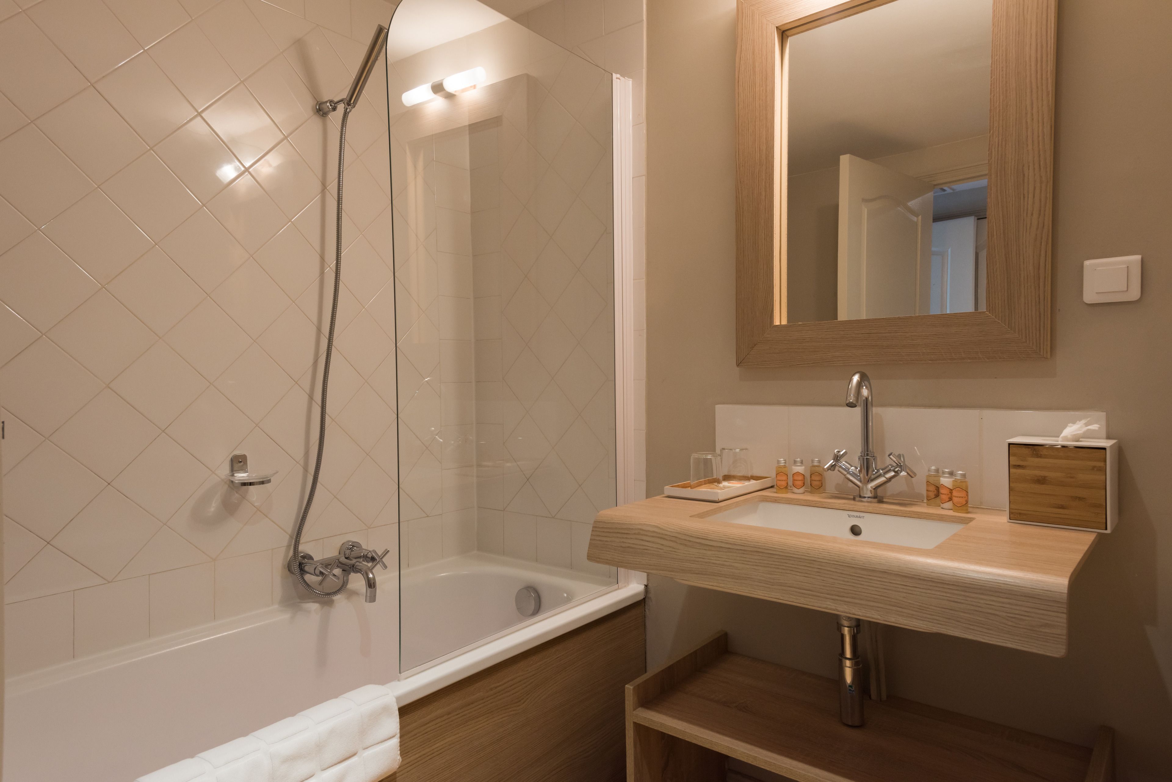 superior double room | bathroom | shower, free toiletries, hair dryer, towels