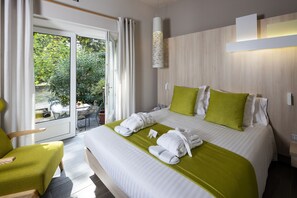 Premium bedding, pillow-top beds, in-room safe, individually decorated