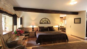 Superior Suite, 1 King Bed, Garden View | Minibar, in-room safe, individually decorated, individually furnished