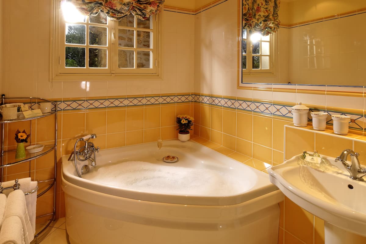 suite | bathroom | free toiletries, hair dryer, bathrobes, slippers
