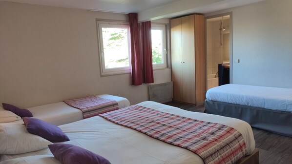 Room, Multiple Beds | Desk, soundproofing, iron/ironing board, free WiFi