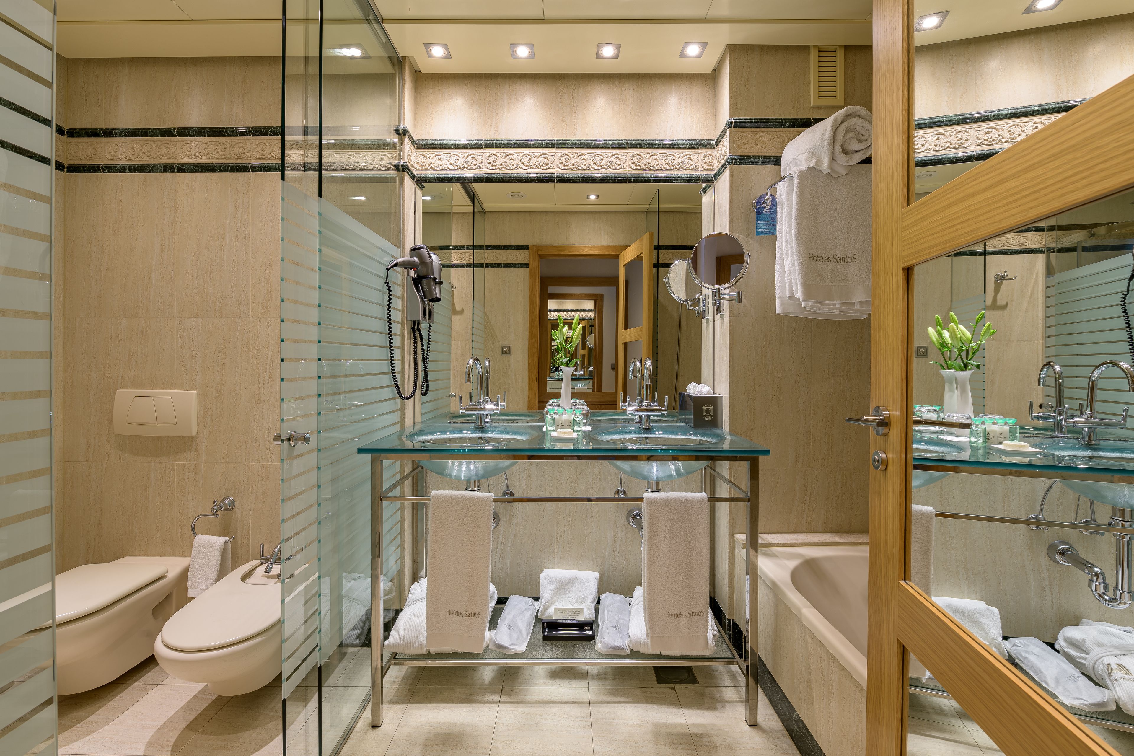 combined shower/bathtub, free toiletries, hair dryer, bathrobes