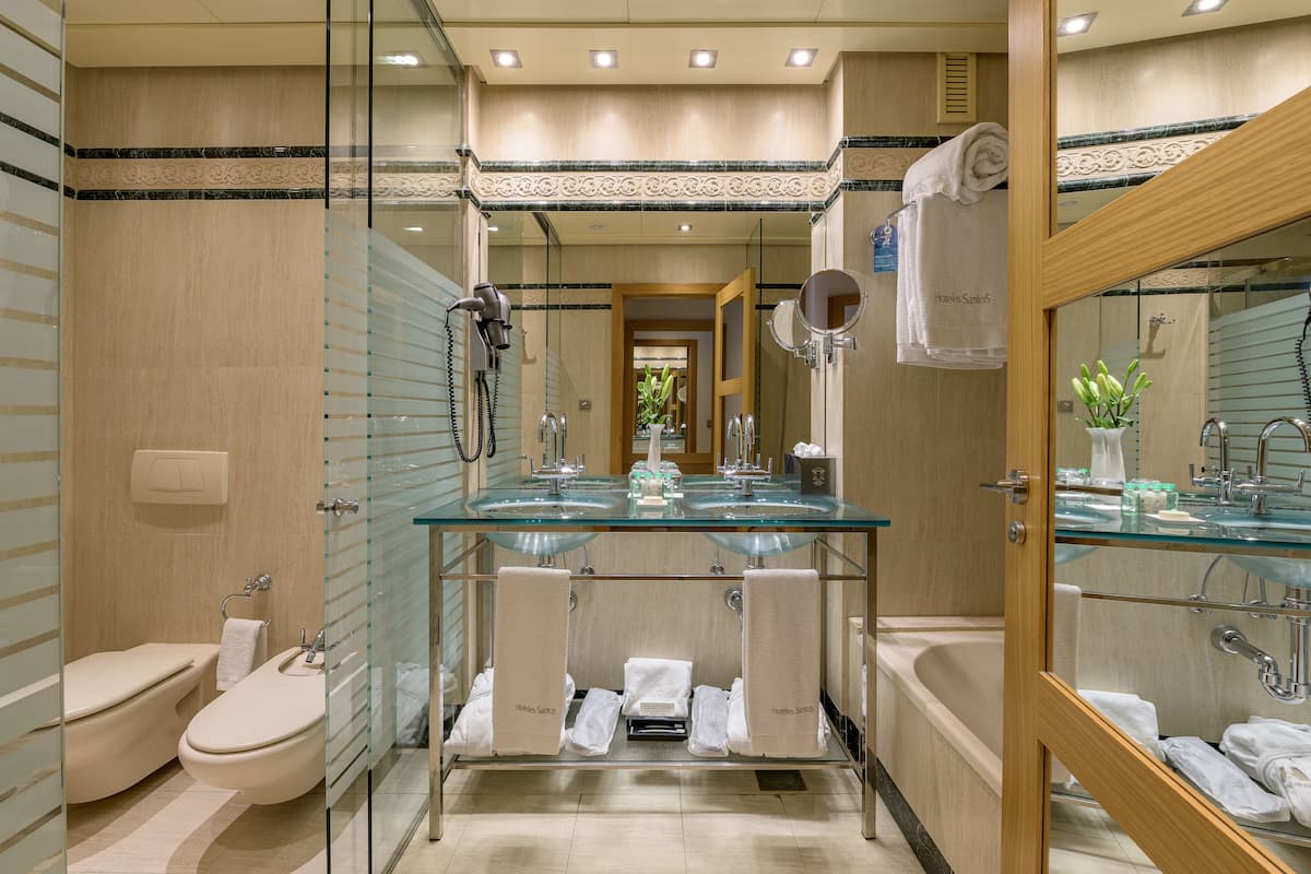 combined shower/bathtub, free toiletries, hair dryer, bathrobes