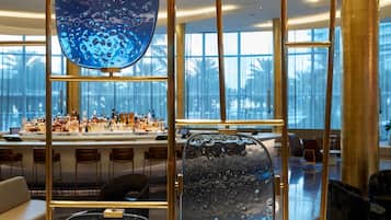 8 bars/lounges, 2 poolside bars