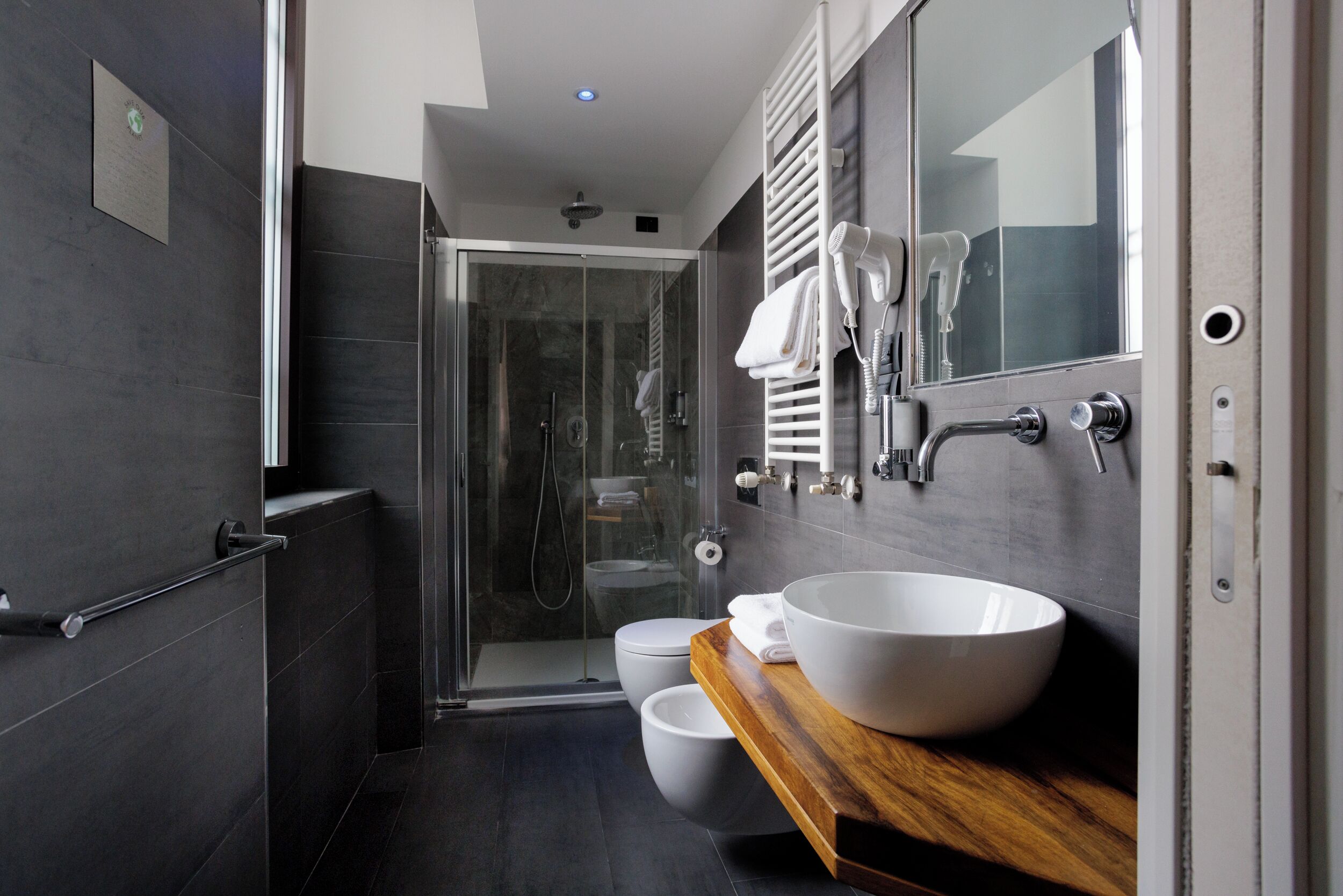 double or twin room | bathroom | shower, rainfall showerhead, eco-friendly toiletries, hair dryer