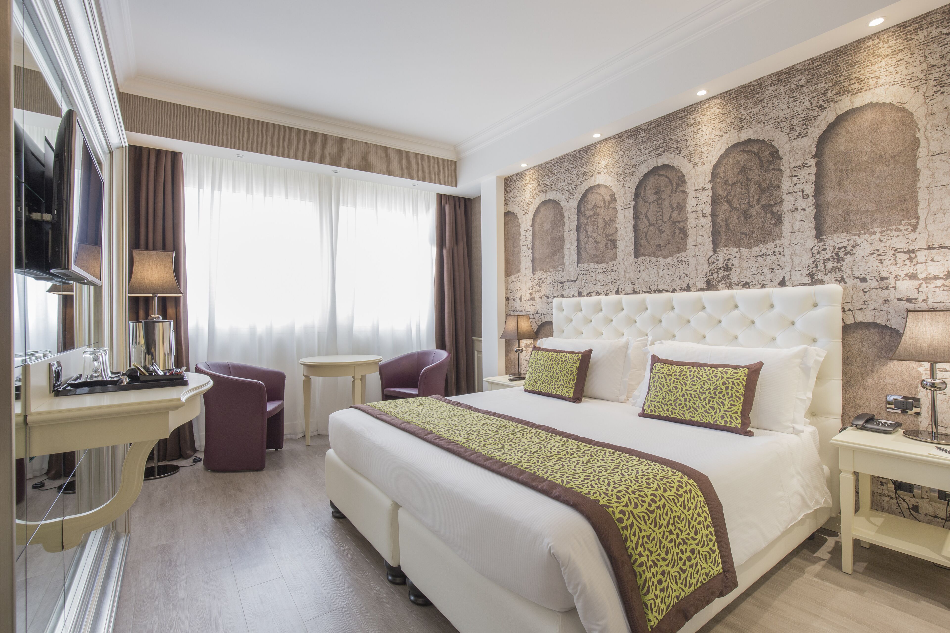 Luxe beddengoed, donzen dekbedden, Select Comfort-bedden, een minibar