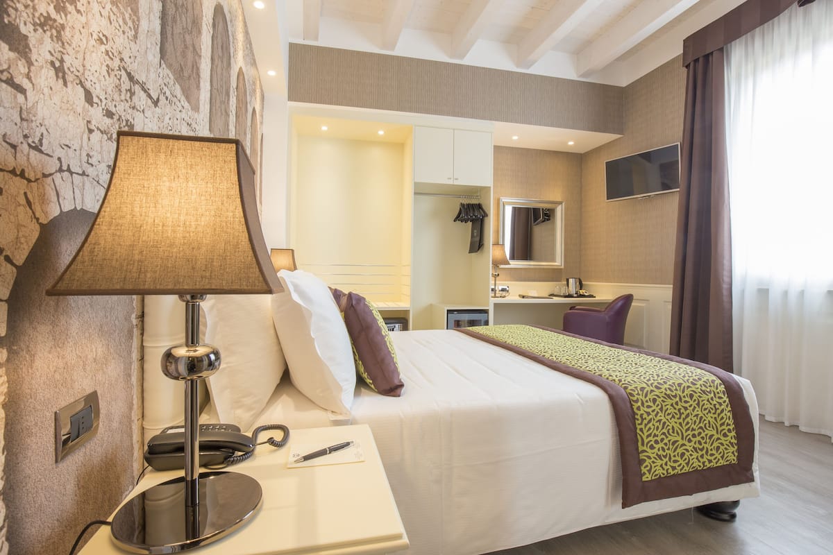 Premium bedding, down duvets, Select Comfort beds, minibar