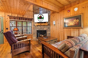 Cabin, 3 Bedrooms, Jetted Tub | Living room | 42-inch LCD TV with cable channels, fireplace