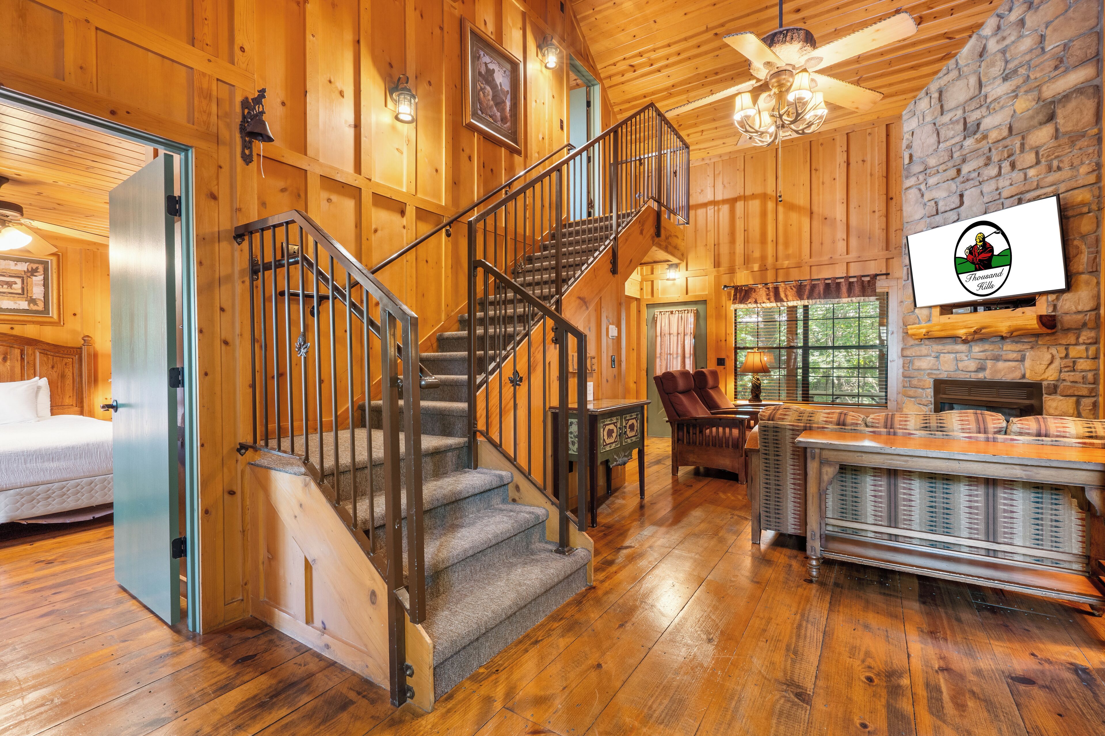 Cabin, 2 Bedrooms, Jetted Tub | Living area | 42-inch LCD TV with cable channels, fireplace