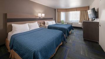 Premium bedding, desk, laptop workspace, iron/ironing board