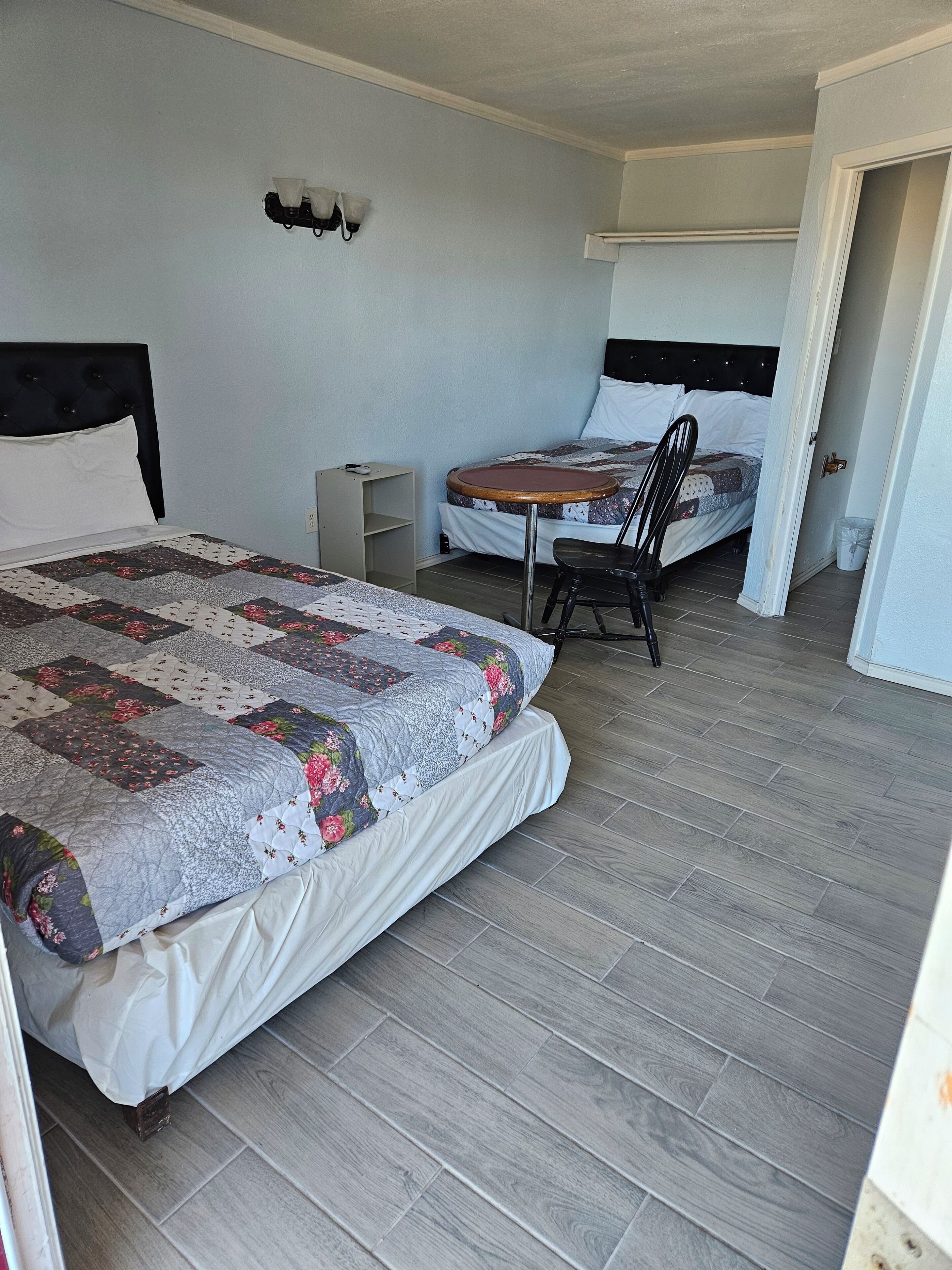 Family Room, 2 Double Beds, Kitchenette | Free WiFi, bed sheets