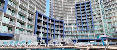 Indoor pool, 2 outdoor pools, open 8 AM to 10 PM, pool umbrellas