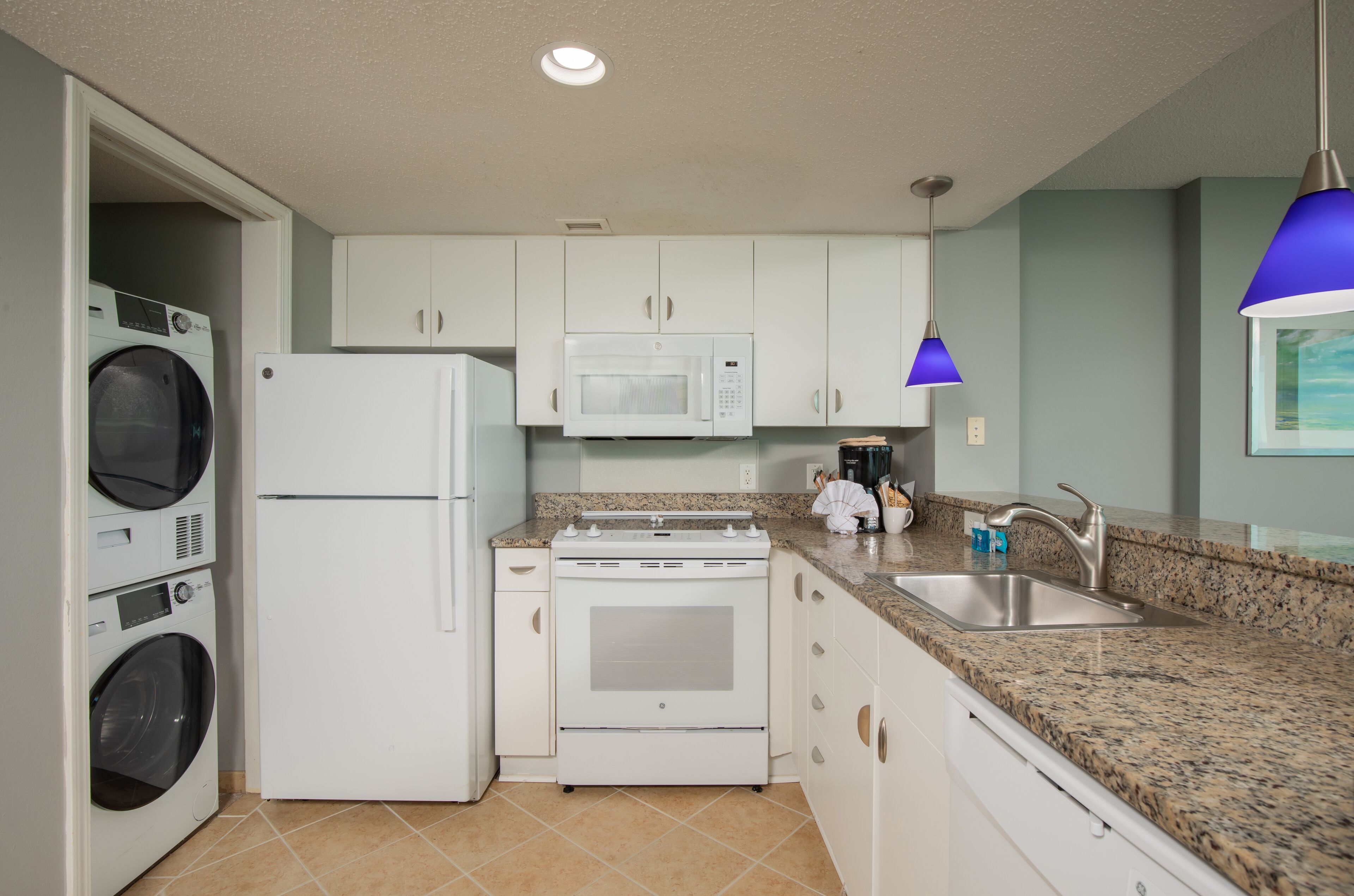 corner three-bedroom suite - ocean front | private kitchen | full-sized fridge, microwave, oven, stovetop