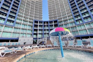 Indoor pool, 2 outdoor pools, open 8 AM to 10 PM, pool umbrellas