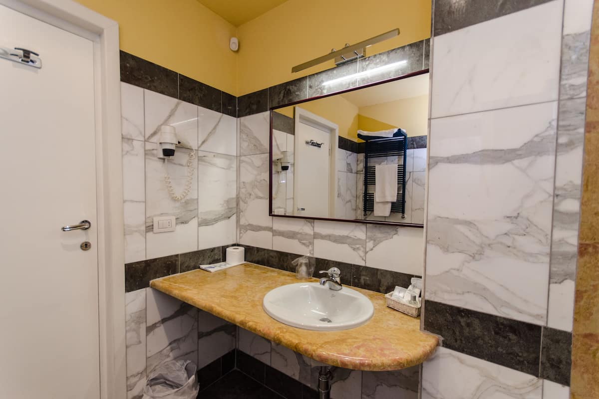 free toiletries, hair dryer, slippers, bidet