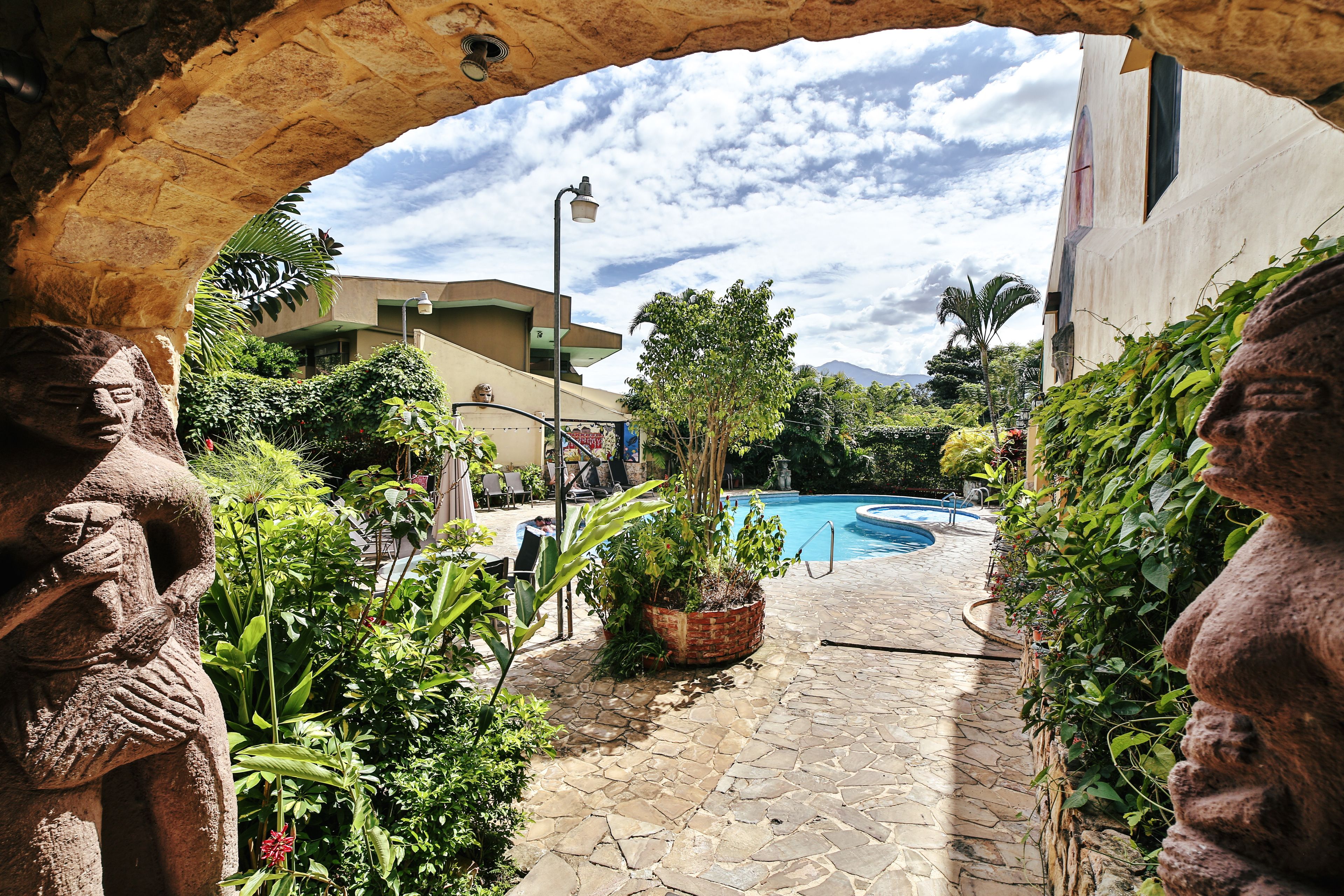 outdoor pool, open 7:00 am to 9:00 pm, pool umbrellas, pool loungers