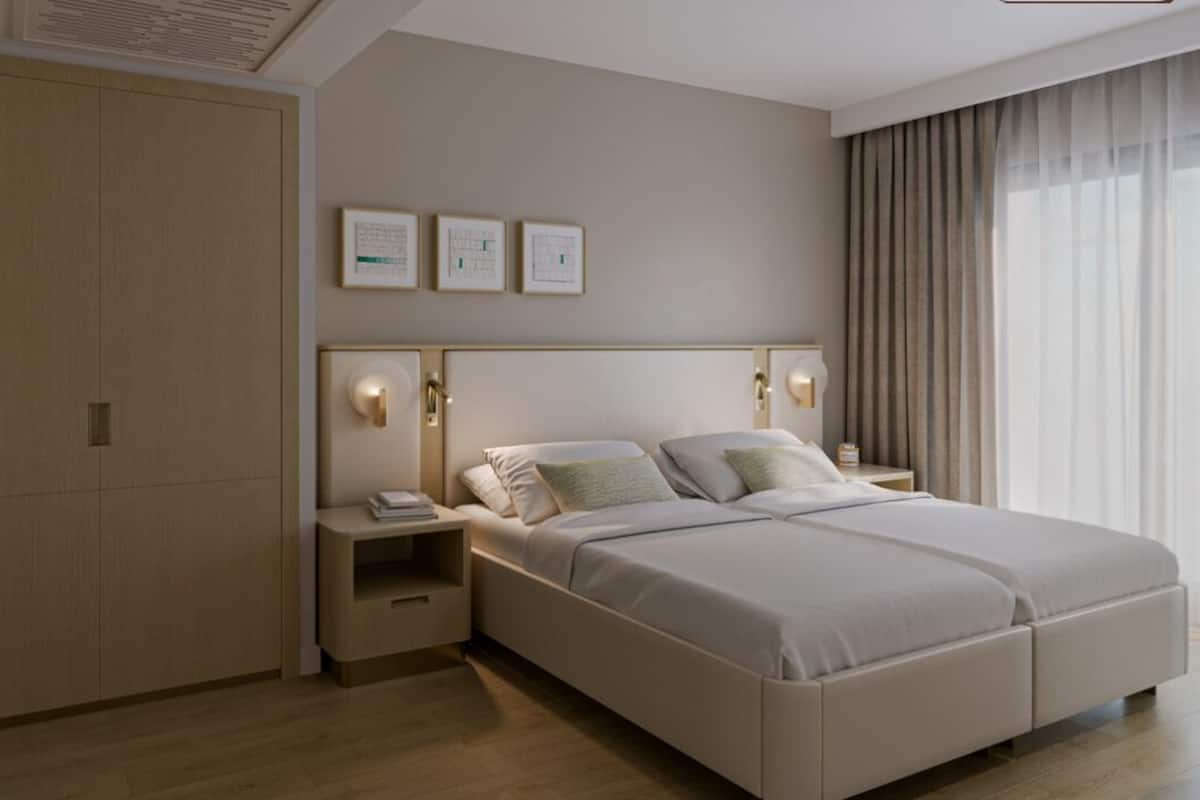 Suite junior | Ropa de cama de alta calidad y artículos del minibar gratis