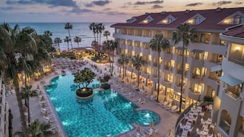 Indoor pool, outdoor pool, pool umbrellas, sun loungers