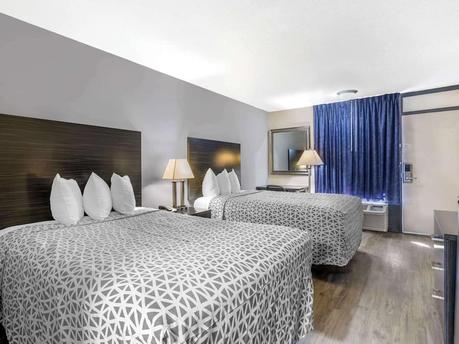 Desk, blackout curtains, iron/ironing board, rollaway beds