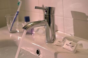 Shower, free toiletries, hair dryer, towels