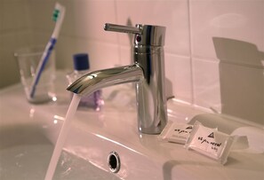 Shower, free toiletries, hair dryer, towels