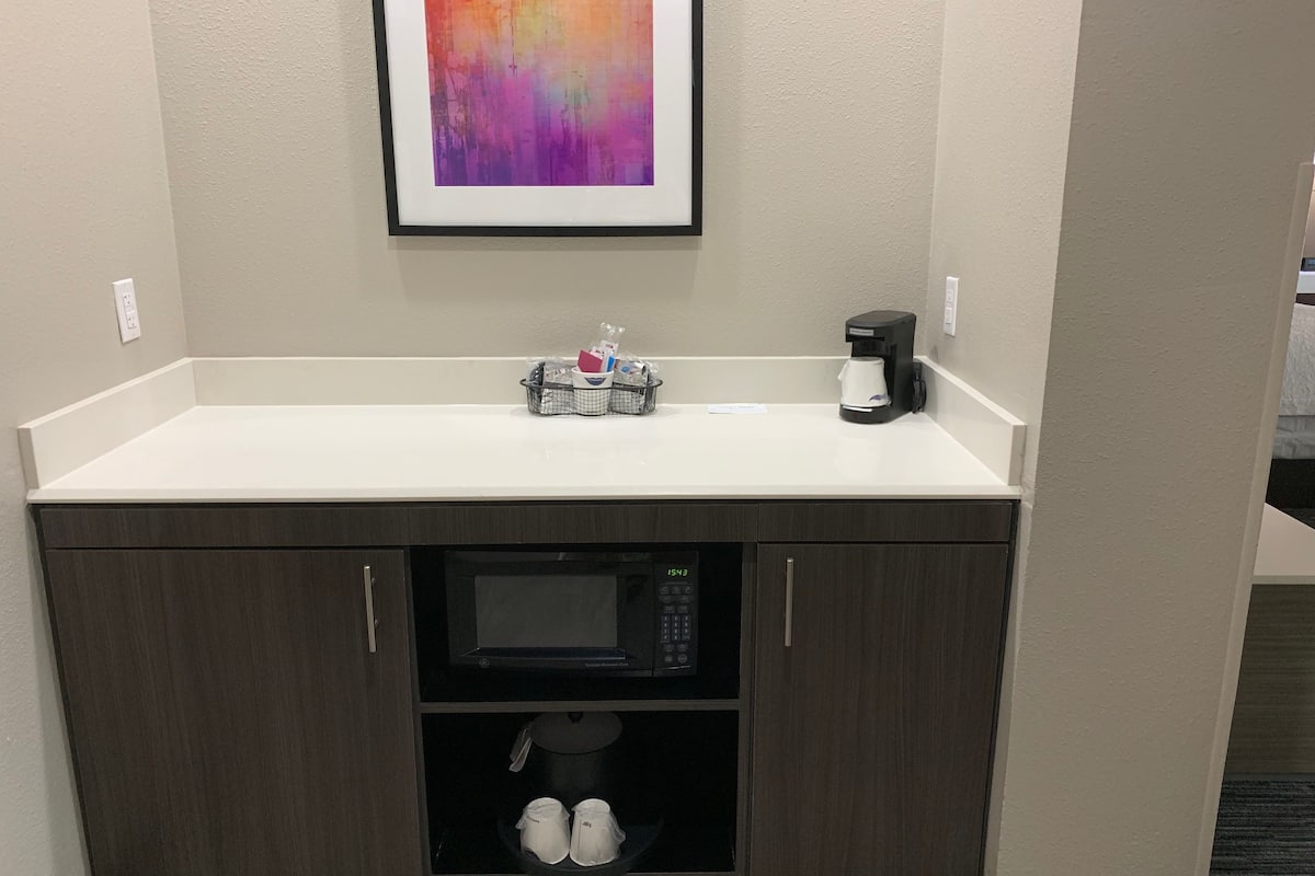 suite, 2 queen beds, non smoking | in-room safe, iron/ironing board, free cots/infant beds, rollaway beds