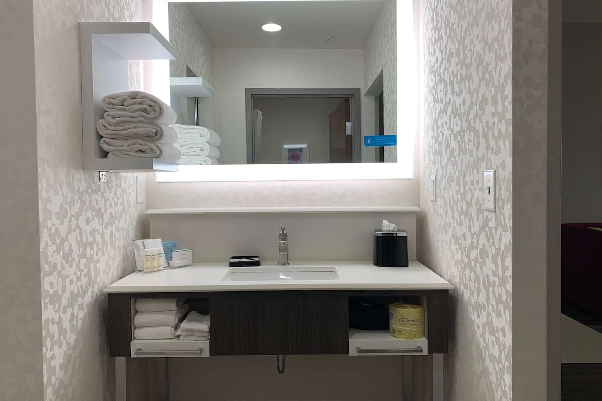 hair dryer, bathrobes, towels