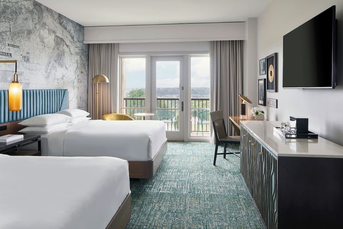 Down comforters, pillowtop beds, in-room safe, desk