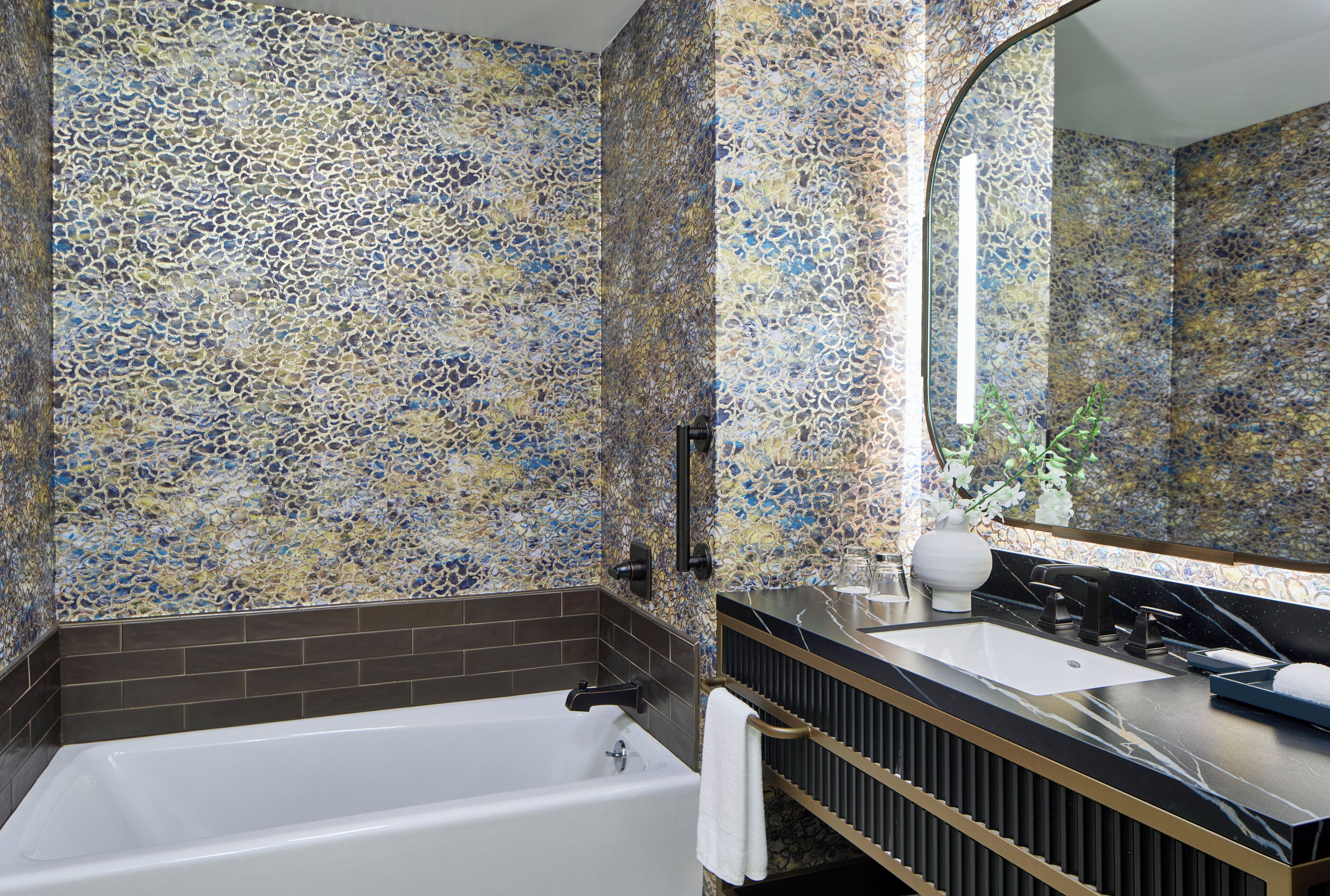 separate bathtub and shower, designer toiletries, hair dryer, towels