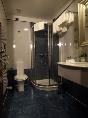 Designer toiletries, hair dryer, towels, soap