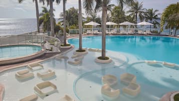 Outdoor pool, pool umbrellas, sun loungers