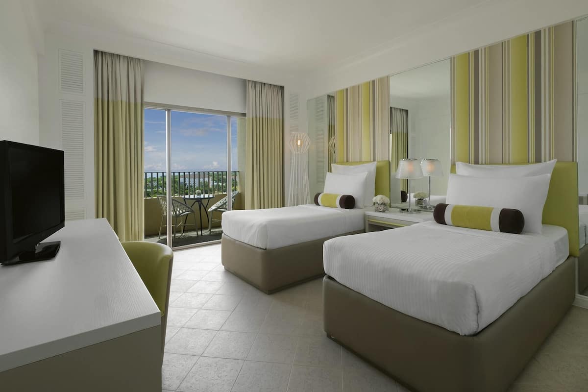 Deluxe Twin Room, Sea View | Minibar, in-room safe, desk, laptop workspace
