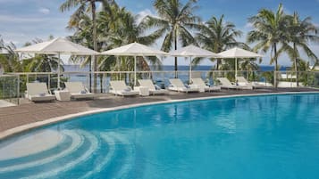 Outdoor pool, pool umbrellas, sun loungers