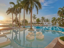 Outdoor pool, pool umbrellas, sun loungers