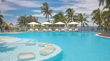 Outdoor pool, pool umbrellas, sun loungers