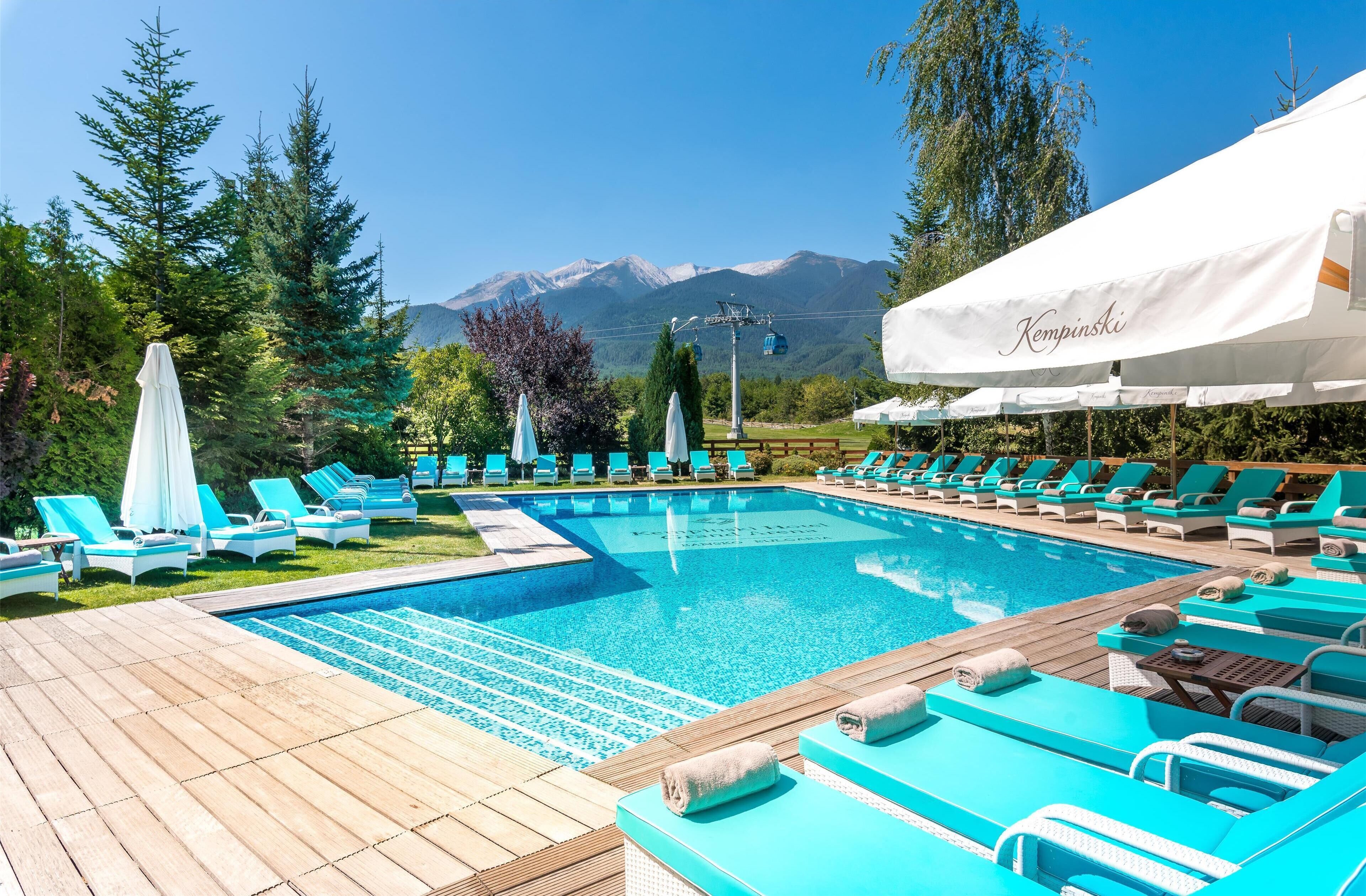 indoor pool, outdoor pool, open 9:00 am to 9:00 pm, pool loungers