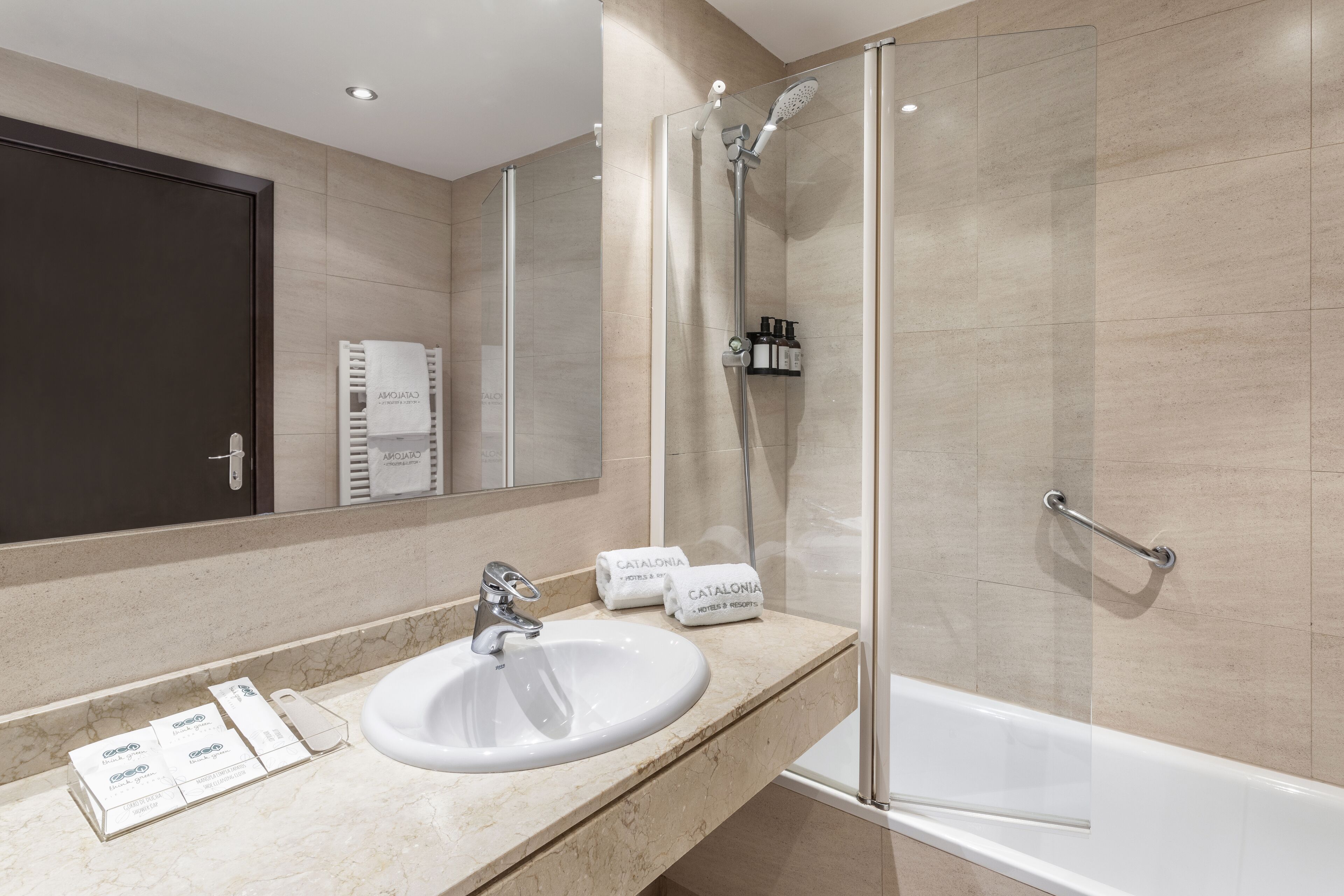 shower, rainfall showerhead, designer toiletries, hair dryer