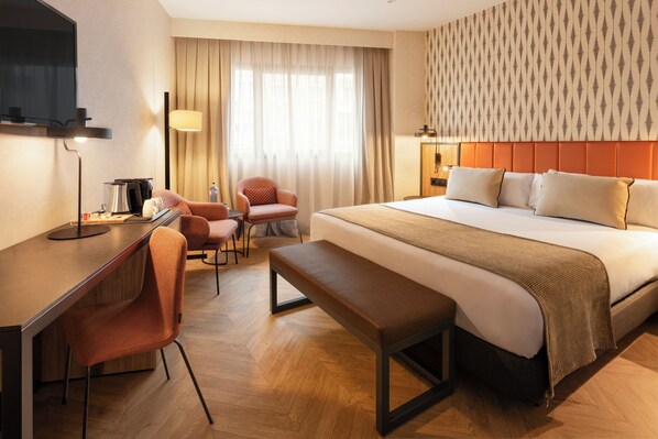 Ropa de cama de alta calidad y minibar 