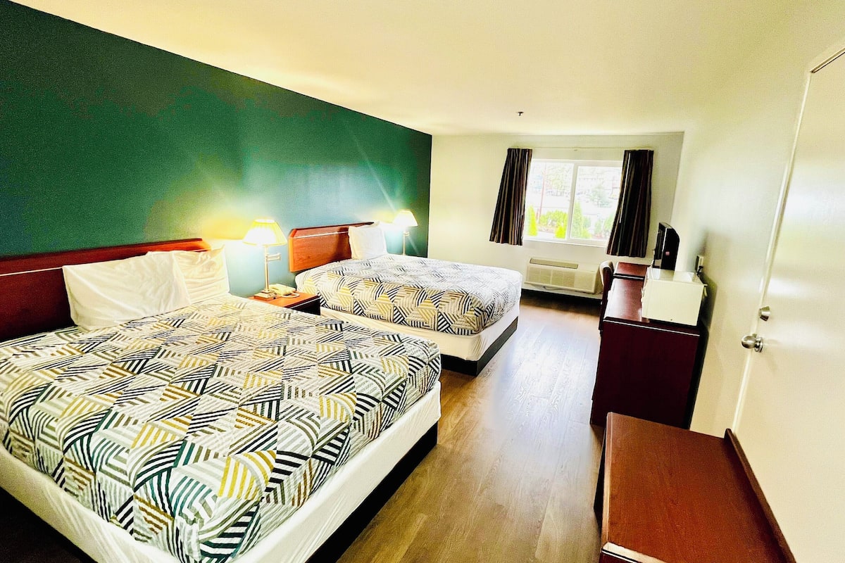 Premium bedding, pillowtop beds, desk, laptop workspace