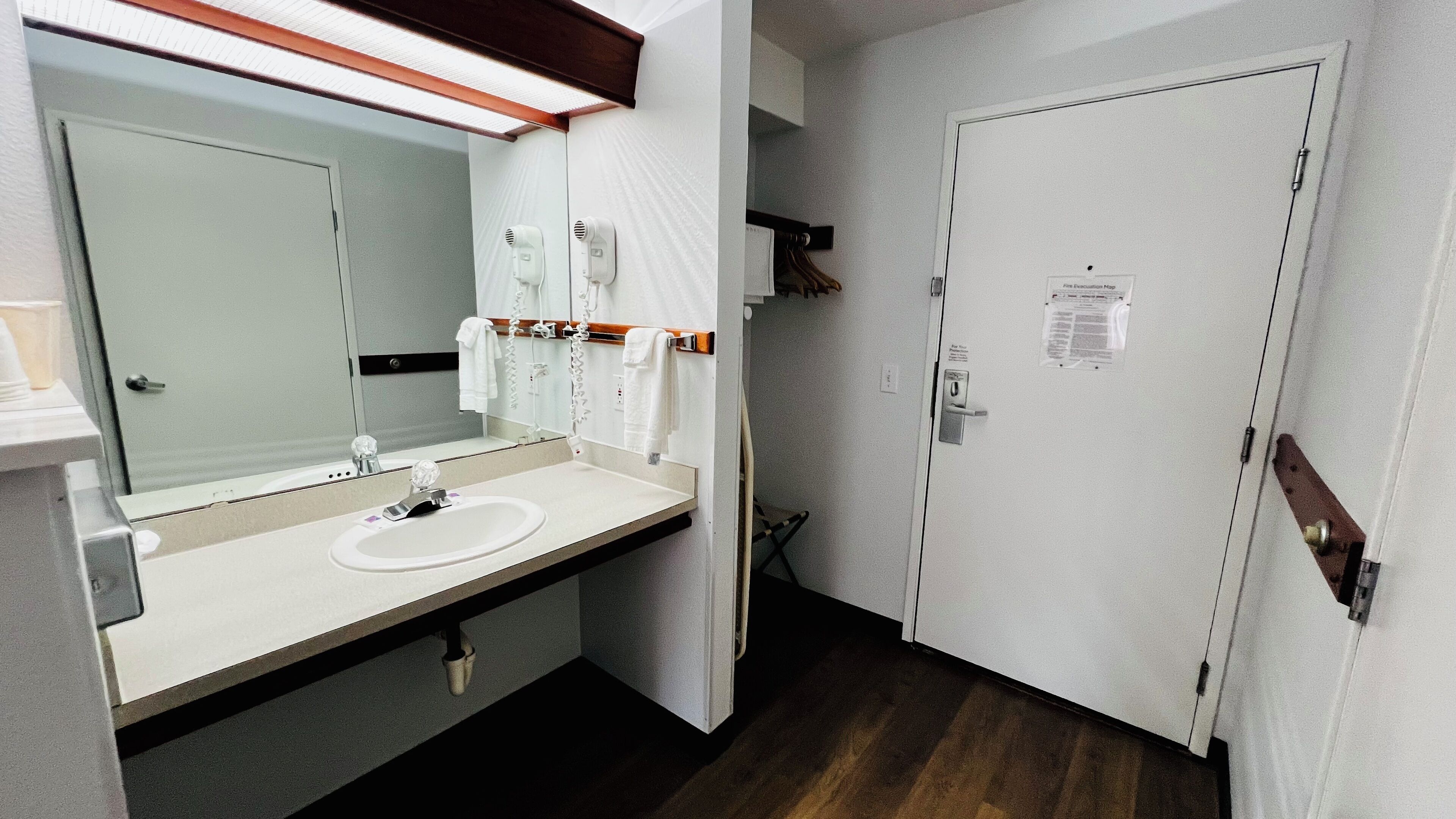Premium bedding, pillowtop beds, desk, laptop workspace