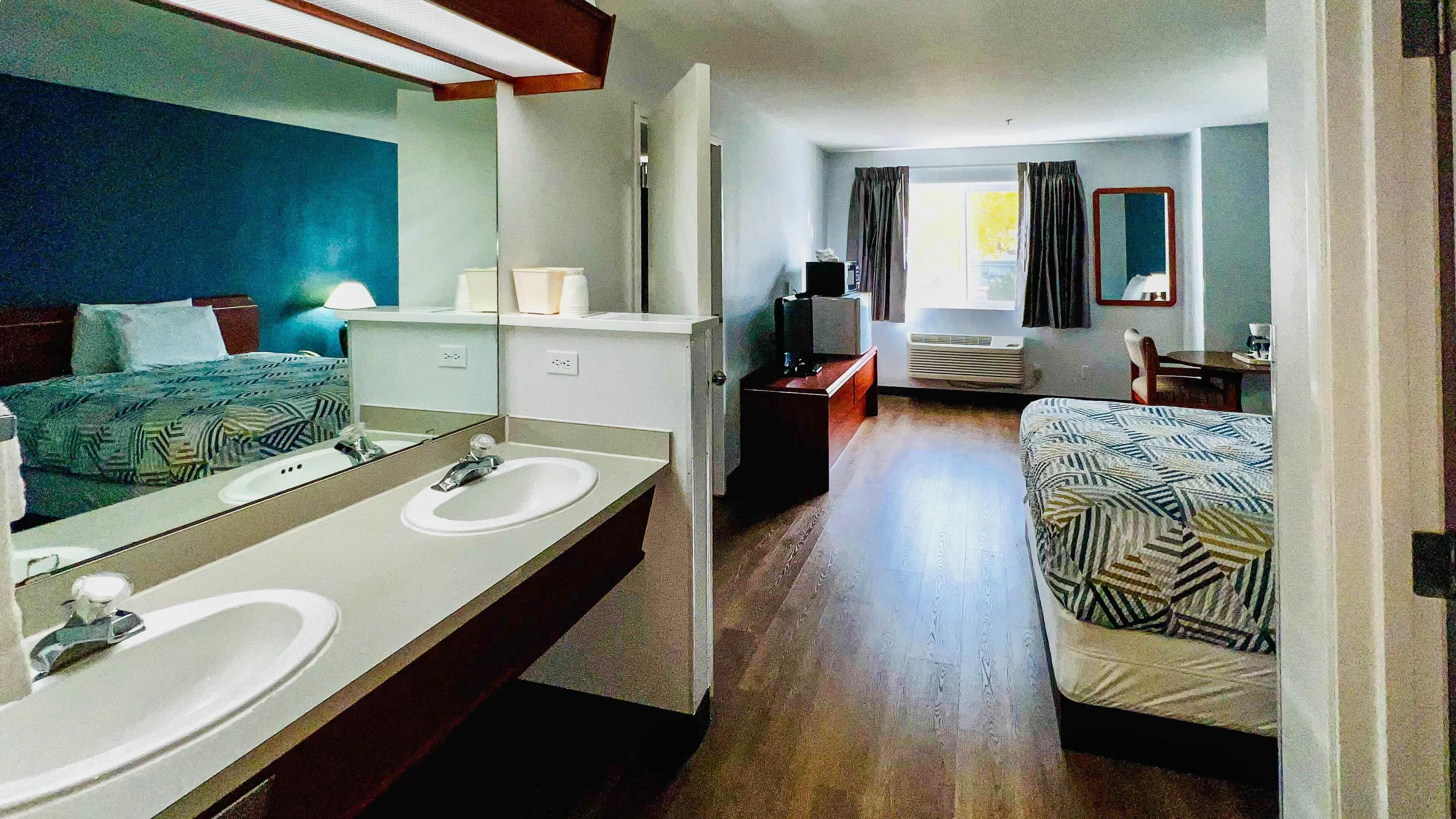 Combined shower/tub, hair dryer, towels, soap