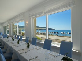 Breakfast, lunch, dinner served; Mediterranean cuisine, beach views