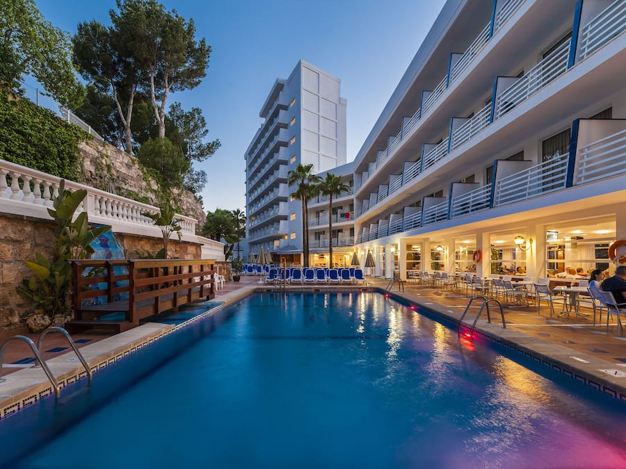 Outdoor pool, a rooftop pool, pool umbrellas