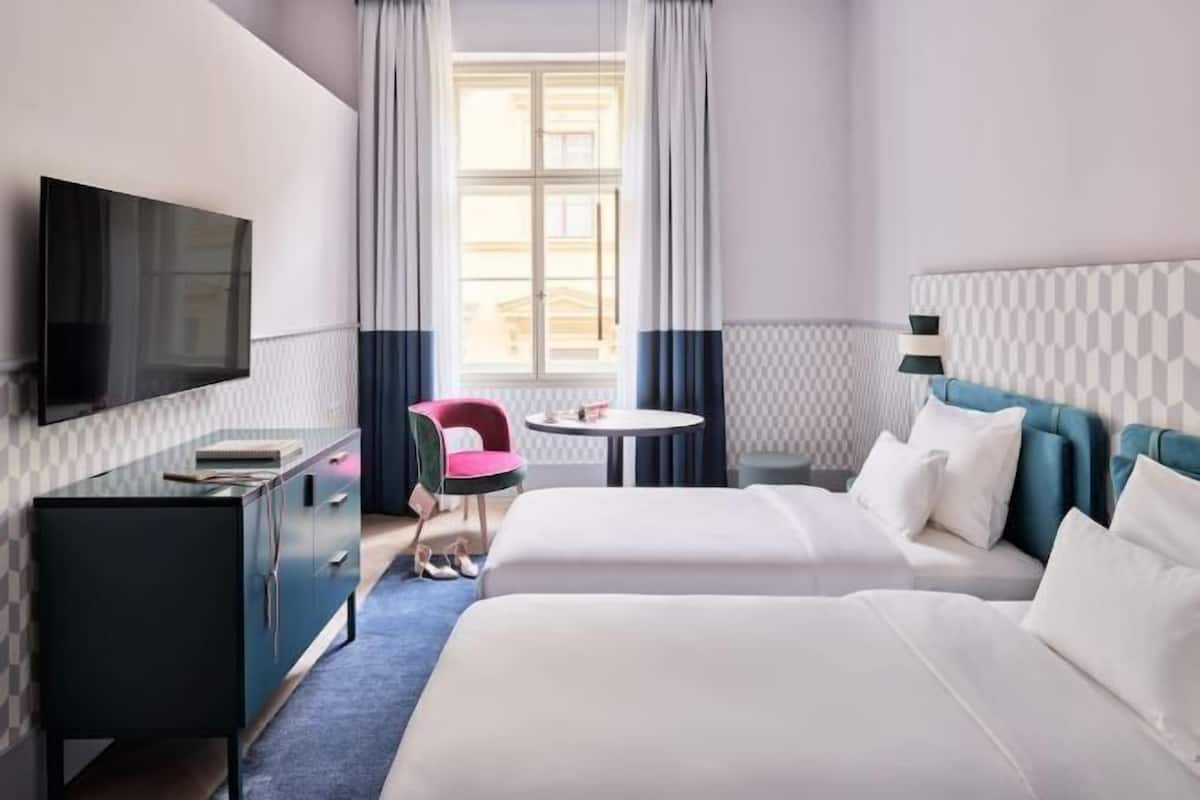 Hypo-allergenic bedding, minibar, in-room safe, desk
