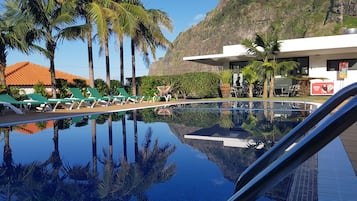 Indoor pool, outdoor pool, pool umbrellas, pool loungers