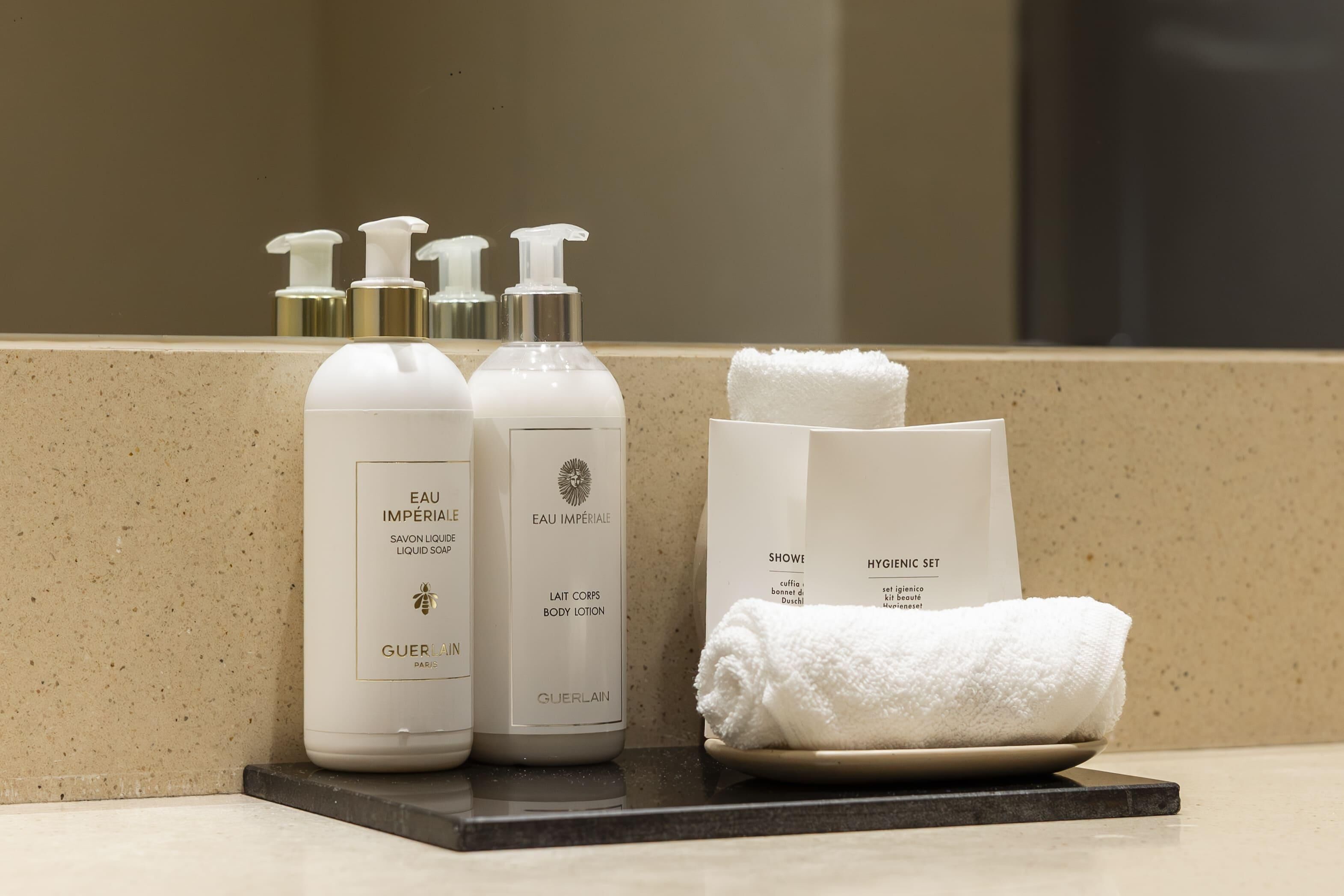 separate bathtub and shower, hair dryer, bathrobes, bidet